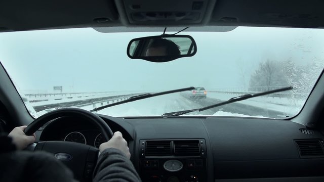 Driving in the snow in slow motion
