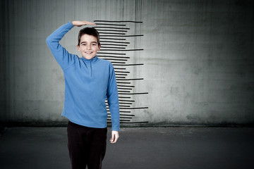 child with the scale of growth