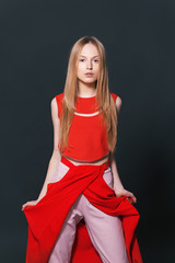 Fototapeta premium Fashion model pose on light background