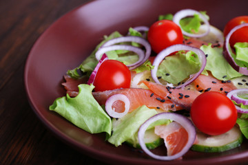 Fresh fish salad with vegetables