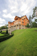 Fototapeta na wymiar Luxury wooden honka house in Mezhyhirya residence
