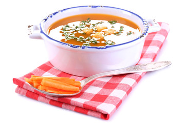 Carrot soup isolated on white