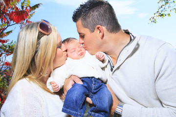 Fototapeta premium A Happy family having fun outdoors in autumn