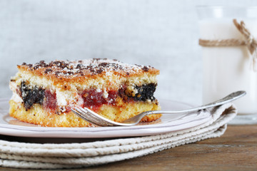 Homemade pie with jam and glass of milk