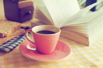 Cup of Coffee in coffee shop vintage color tone style