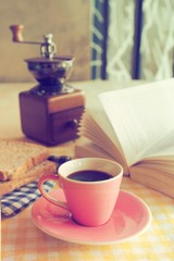 Cup of Coffee in coffee shop vintage color tone style