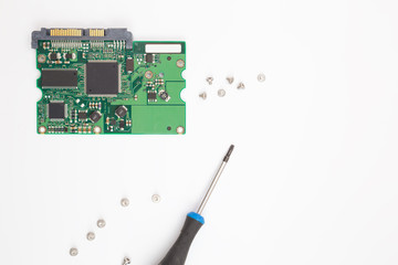 scheme of the hard drive,cogs  and screwdriver