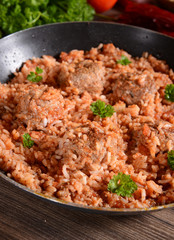 meat balls with rice and tomatoes
