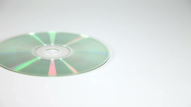 Shot of a womans leg in high heels steping on cd