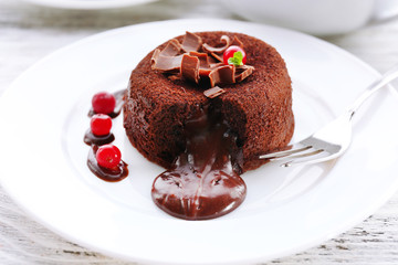 Hot chocolate pudding with fondant centre, close-up