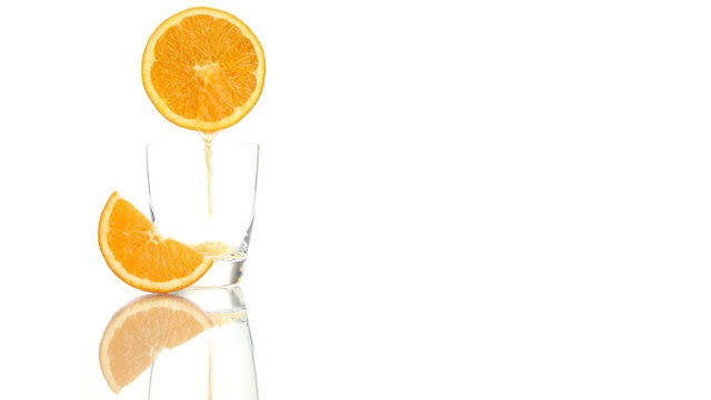 squeezed orange juice poured into the glass