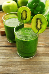 Green fresh healthy juice with fruits and vegetables