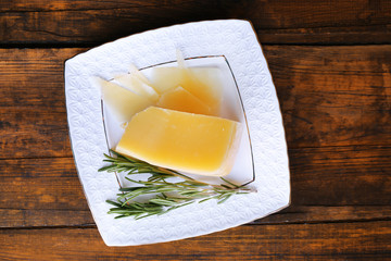 Parmesan cheese with sprig of rosemary