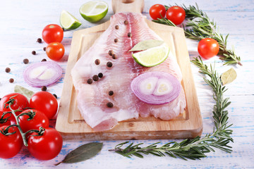 Pangasius fillet with herb, spices and vegetables