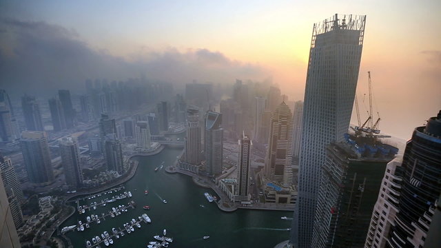 time lapse aerial view skyscraper foggy weather Dubai