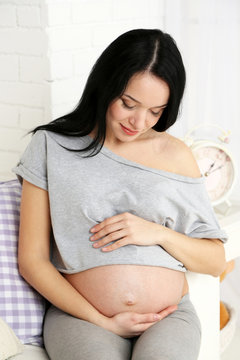 Young pregnant woman relaxing