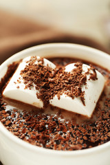 Hot chocolate with marshmallows in mug, close-up