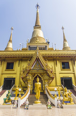 Golden buddha and blue sky