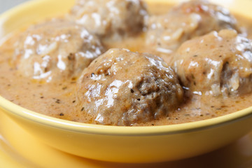 Meatballs in tomato sauce .