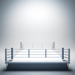 Empty white boxing ring.