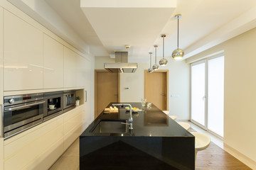 Beige interior of kitchen in apartment