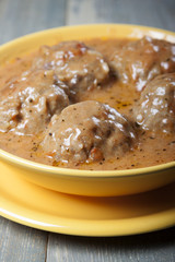 Meatballs in tomato sauce .