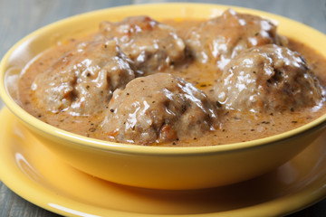 Meatballs in tomato sauce .