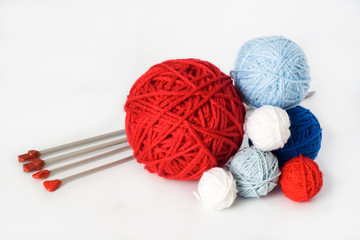 Colorful balls and needles for knitting
