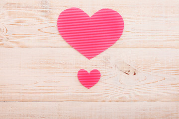 Hearts from paper. Valentines day. Wooden background