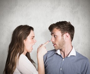 Composite image of casual young couple in an argument - Powered by Adobe
