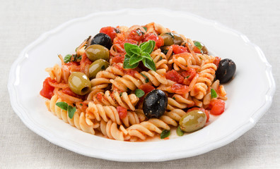fusilli with tomato olives and oregano