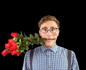 Composite image of geeky hipster biting a bunch of roses