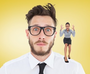 Composite image of furious businesswoman gesturing