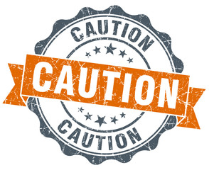 caution orange vintage seal isolated on white