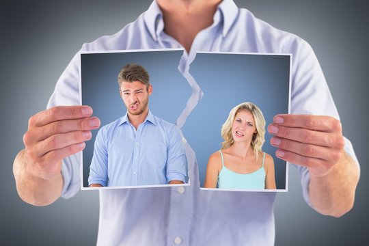 Composite image of young couple making silly faces