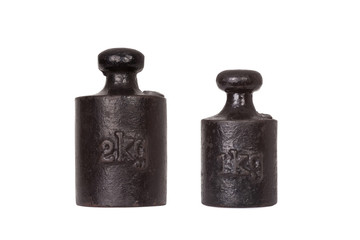 Vintage iron weights on the white background.