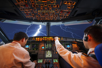Pilots in the plane cockpit,lighting