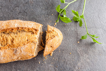 Fresh bread and green parsley