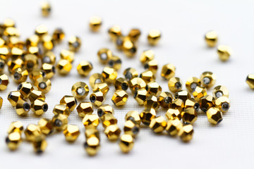 Golden glass beads