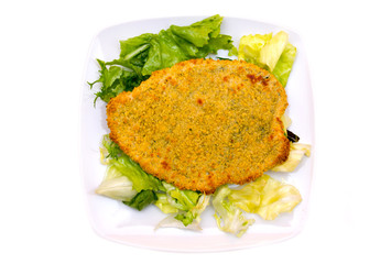 Breaded cutlet with salad on white background top view