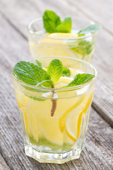 refreshing mint lemonade in glasses, close-up