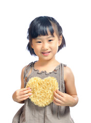 Asian little girl holding the heart pouch