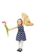 Girl flowers and a teddy bear