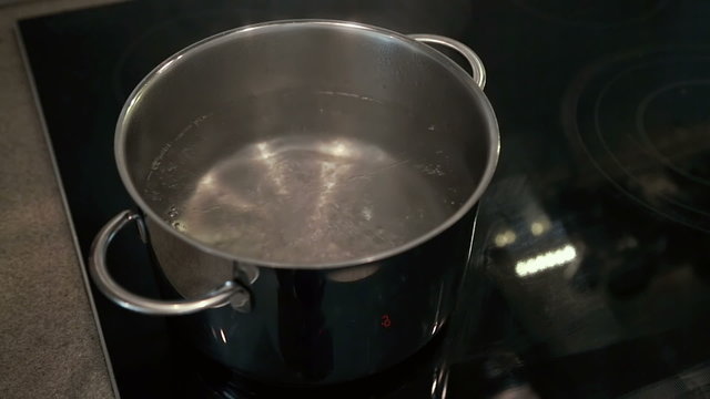 Iron pan of boiling water