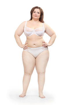 Overweight woman dressed in bikini.