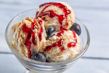 Bowl with ice cream and fresh blueberry