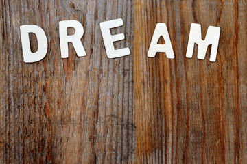 dream word on wooden background