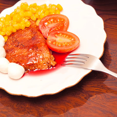 Dish with fried meat and sauce