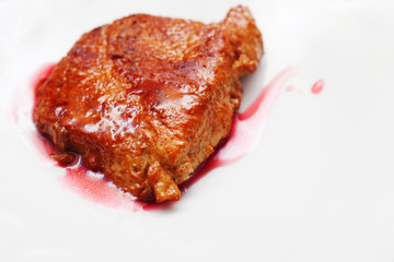 Dish with fried meat and sauce