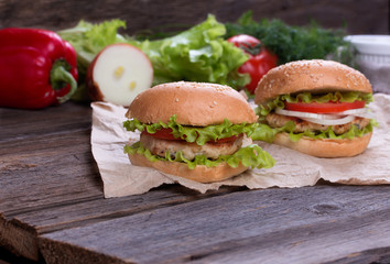 Delicious homemade hamburger on wood